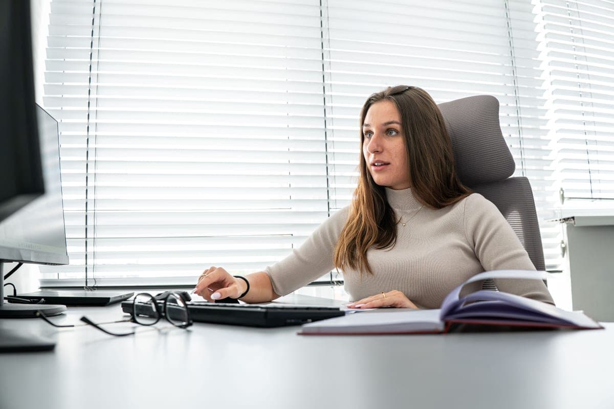 A Bilvao colleague working through paperwork